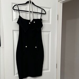 Elegant Black Dress with Pearl Accents